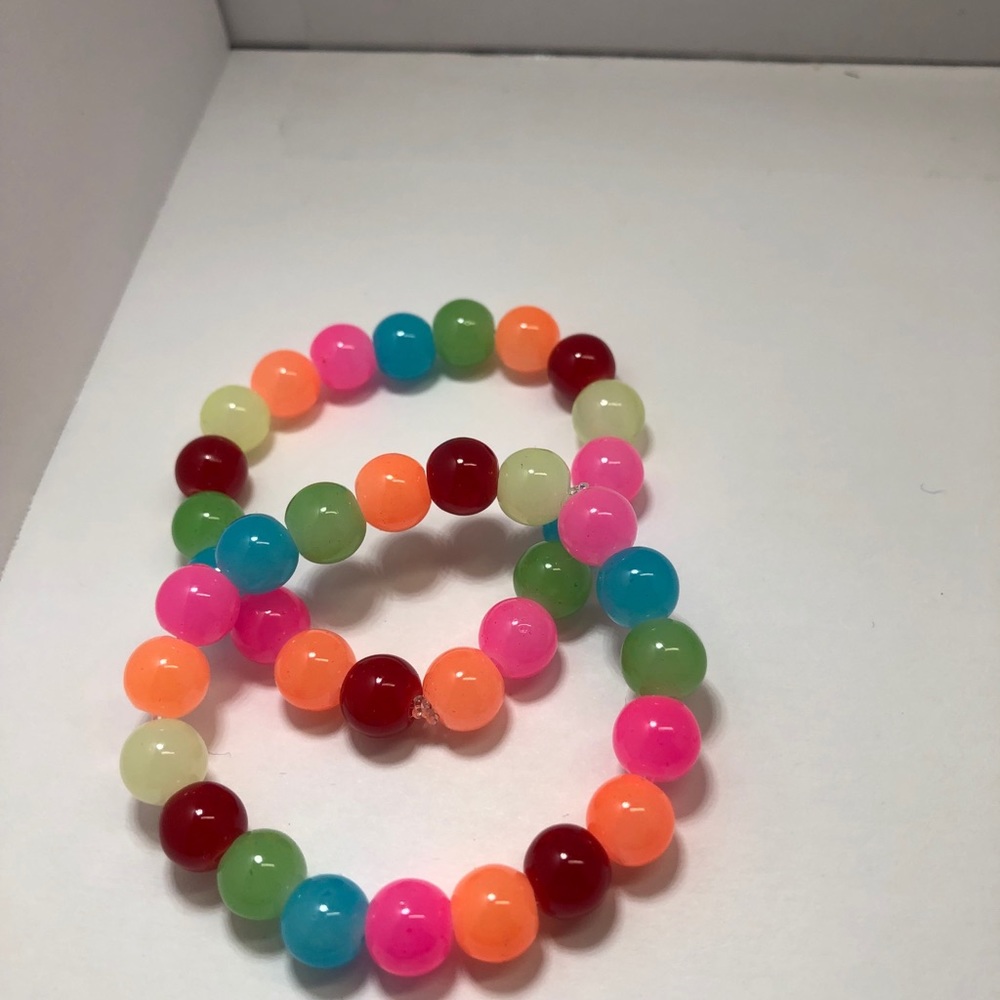 Bright colorful lot of two children’s bracelets